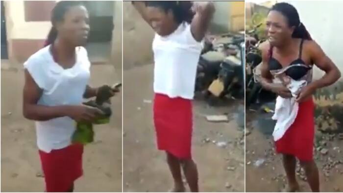 Nigerian man seen on camera removing his clothes after he was caught disguising as a woman (video)