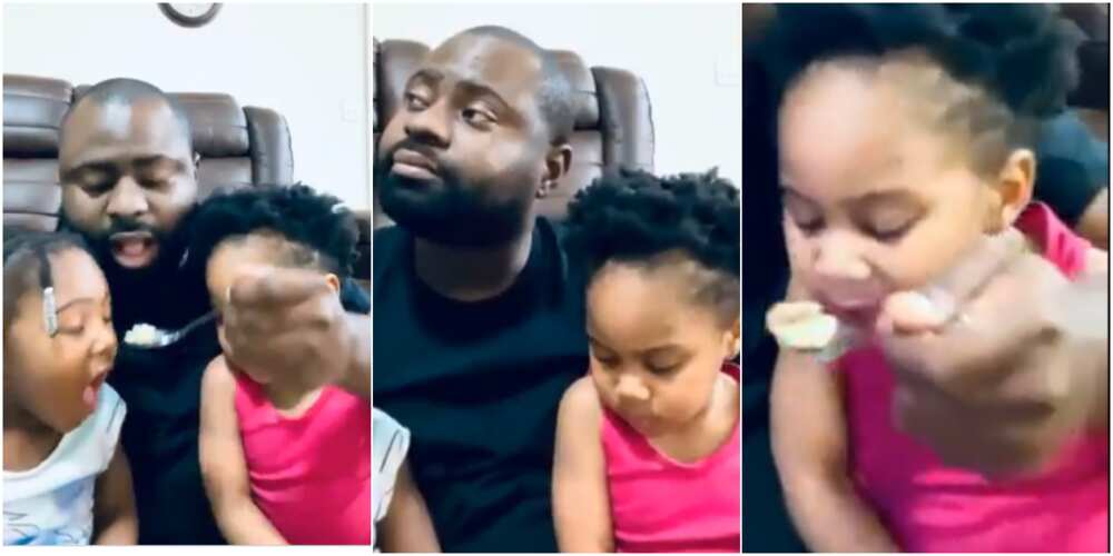 Video of dad using his daughters to "catch cruise" as he eats their cereal while they watch causes stir