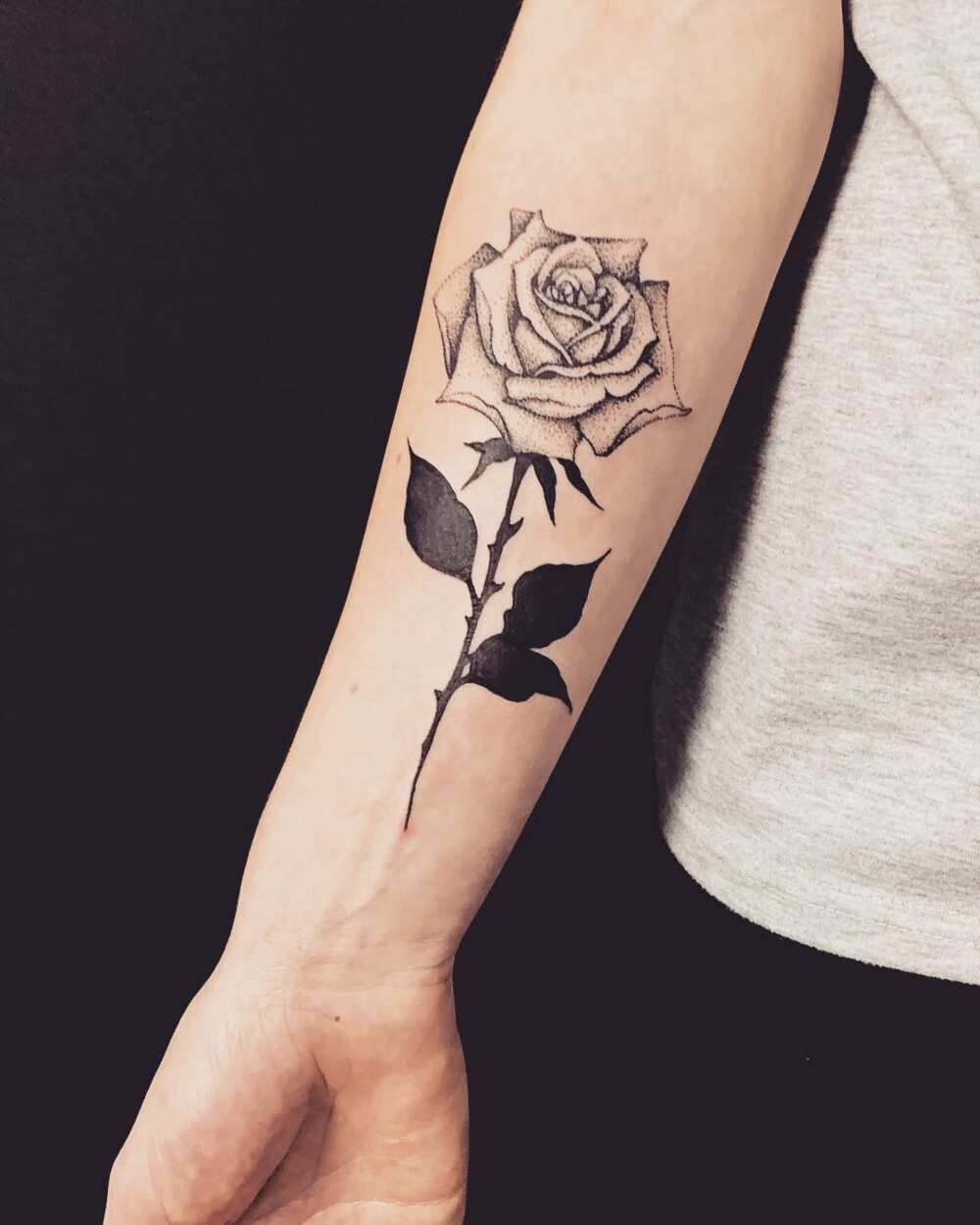 forearm tattoo rose