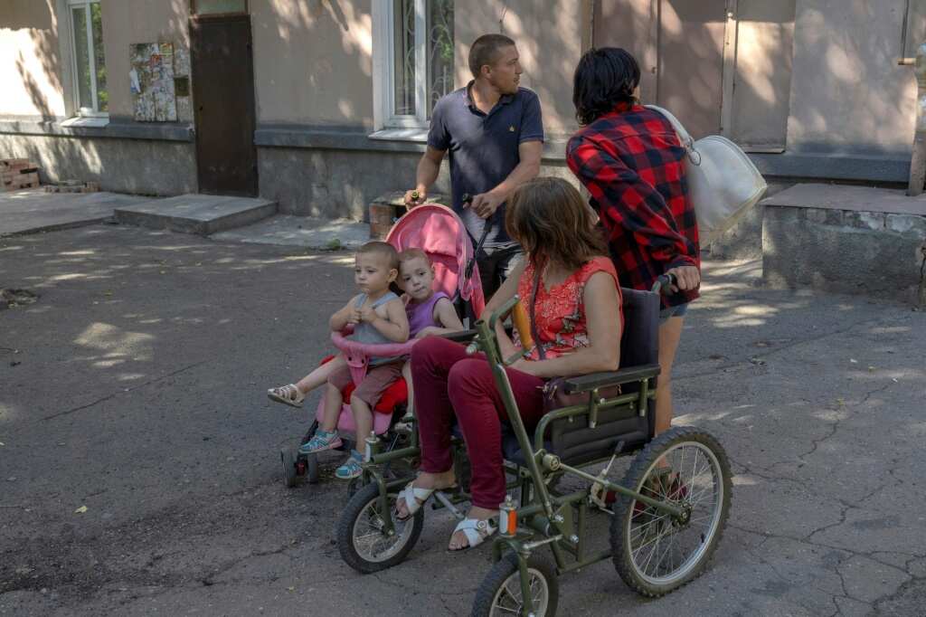 Stay or go? Parents agonise as shells fall on Ukraine's Bakhmut