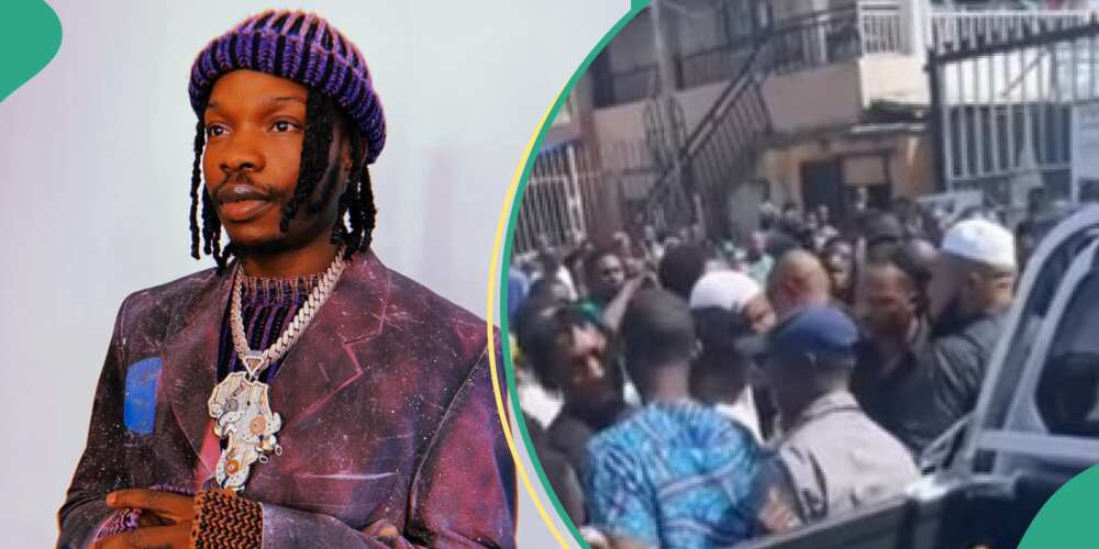 Naira Marley Shares Money As Crowd Surrounds Him After Jumat Prayer at ...