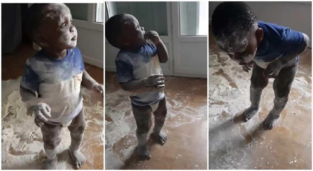 Little black boy spills his mother's powder and tries to walk away.
