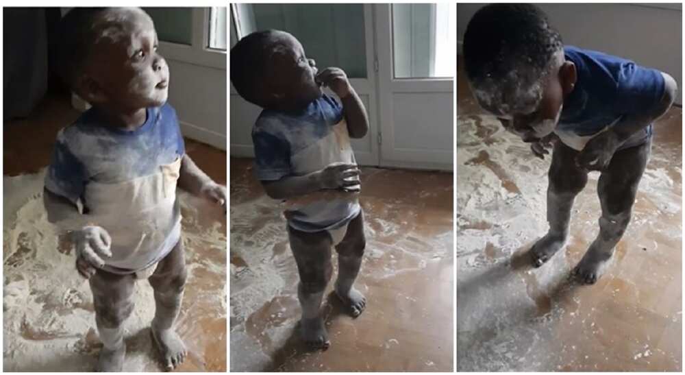 Little black boy spills his mother's powder and tries to walk away. Little black boy spills his mother's powder and tries to walk away.