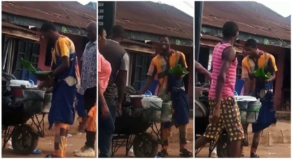 Young man sells cooked rice in wheelbarrow in Edo state.