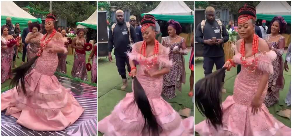 A beautiful Nigerian bride in a peach gown seen dancing at her reception