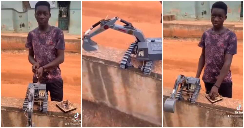 Ghanaian boy builds excavator, Methodist Technical Institute in Kumasi in the Ashanti region of Ghana, boy builds excavator