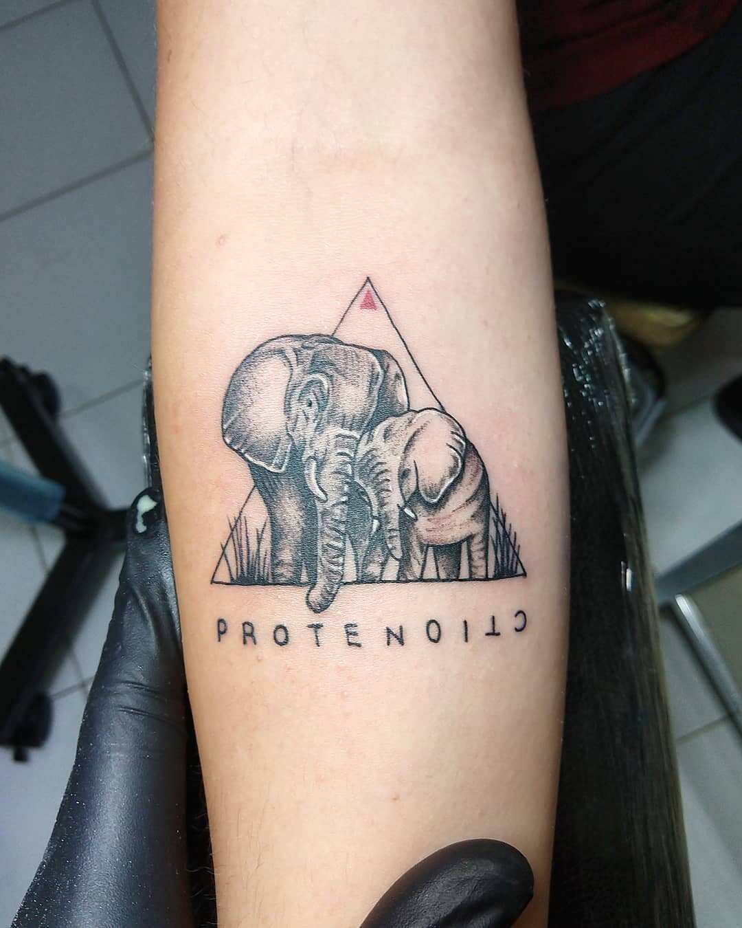 Baby elephant tattoo by Mully TattooNOW