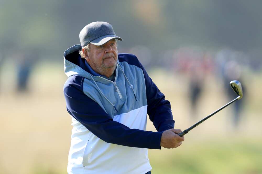 Johann Rupert plays his second shot on the third hole on Day 1 of the Alfred Dunhill Links Championship