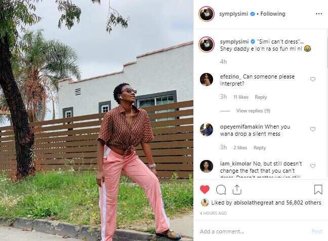 Simi blasts trolls who say she cannot dress, wears Adekunle's clothes in sizzling photos