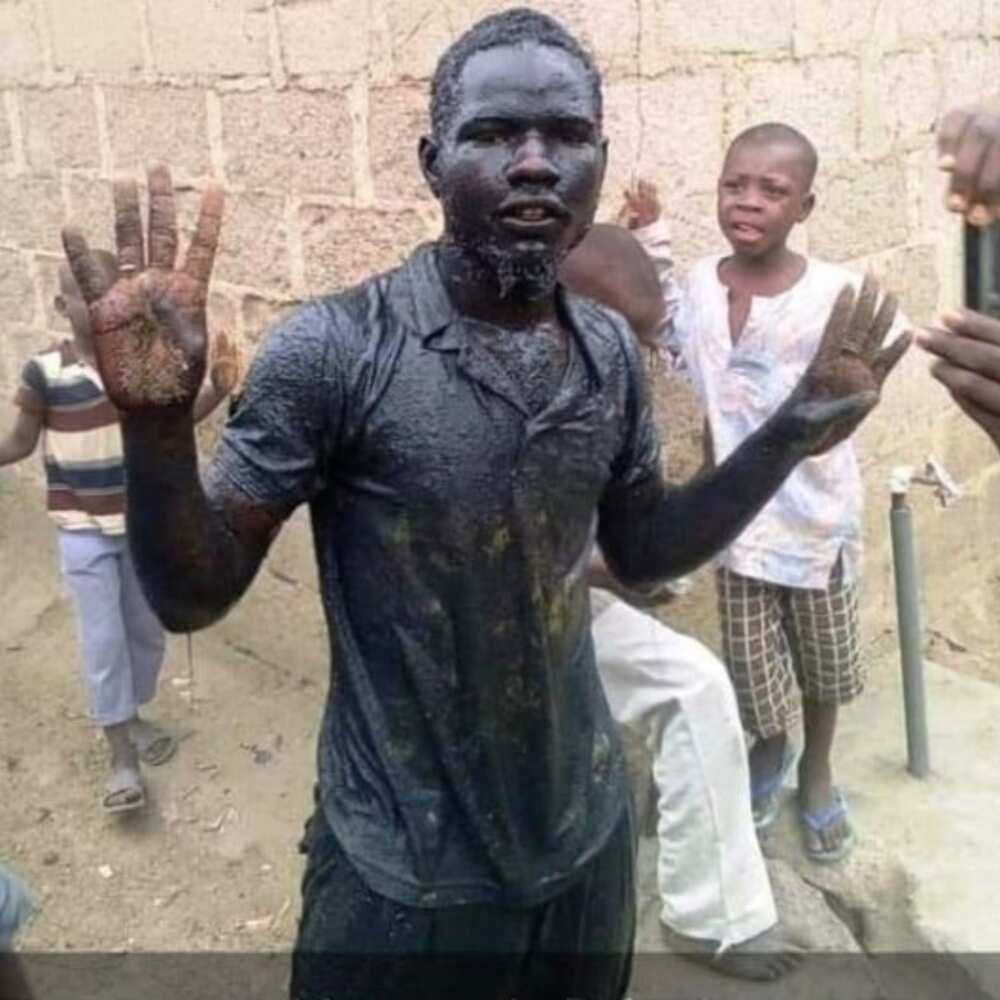 Election 2019: Happy man dunks himself inside gutter to celebrate President Buhari's win
