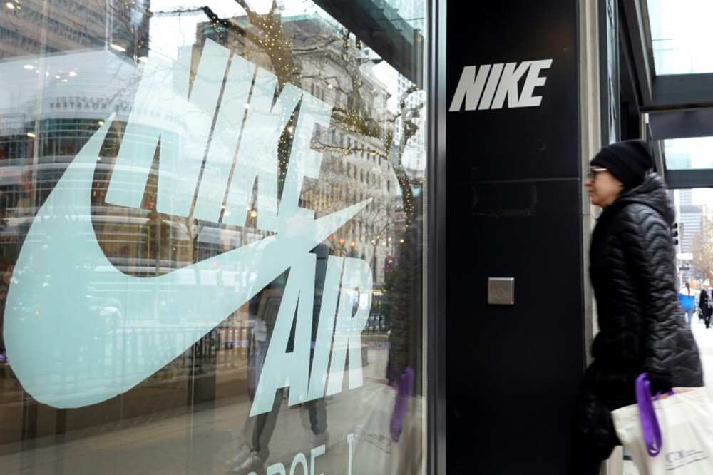 Nike shares fell after the sports giant reported lower profits