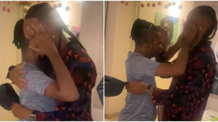 "The way he feels his face at intervals": Emotional video of Flavour and his adopted son stirs reactions