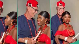 Nigerian lady celebrates as she marries handsome Oyinbo man during beautiful traditional wedding