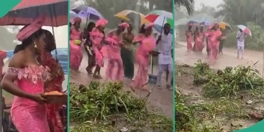 Lady enters rain during her wedding.