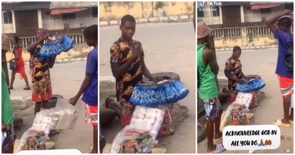 Young hawker, Nigerian kid hawking prays, hawker prays on the road, video of hawker praying