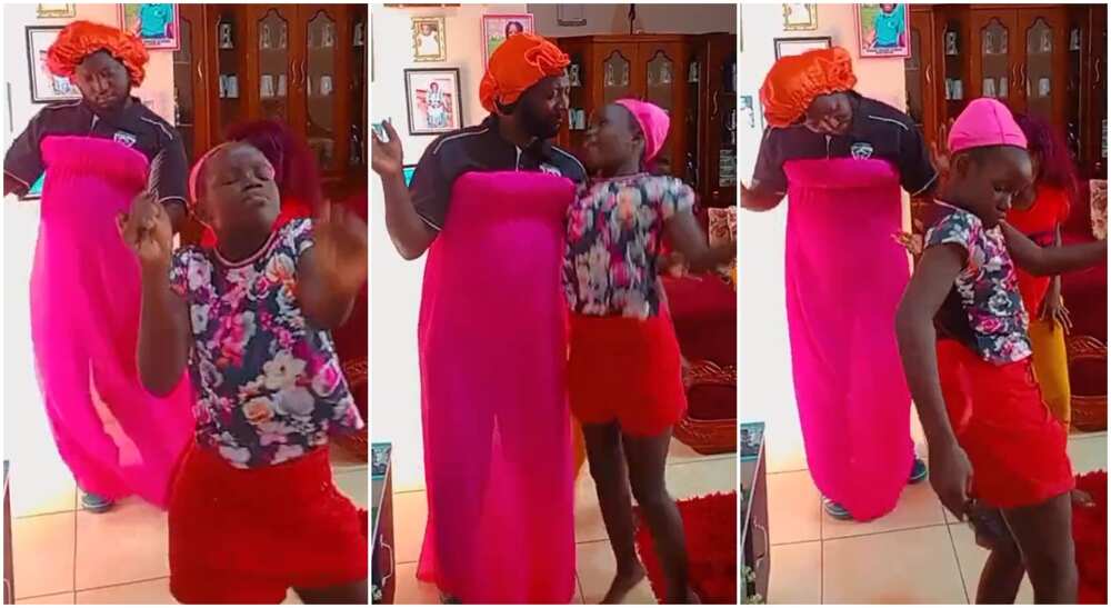 Photos of a man dressed in a pink gown. Photos of a man dressed in a pink gown.