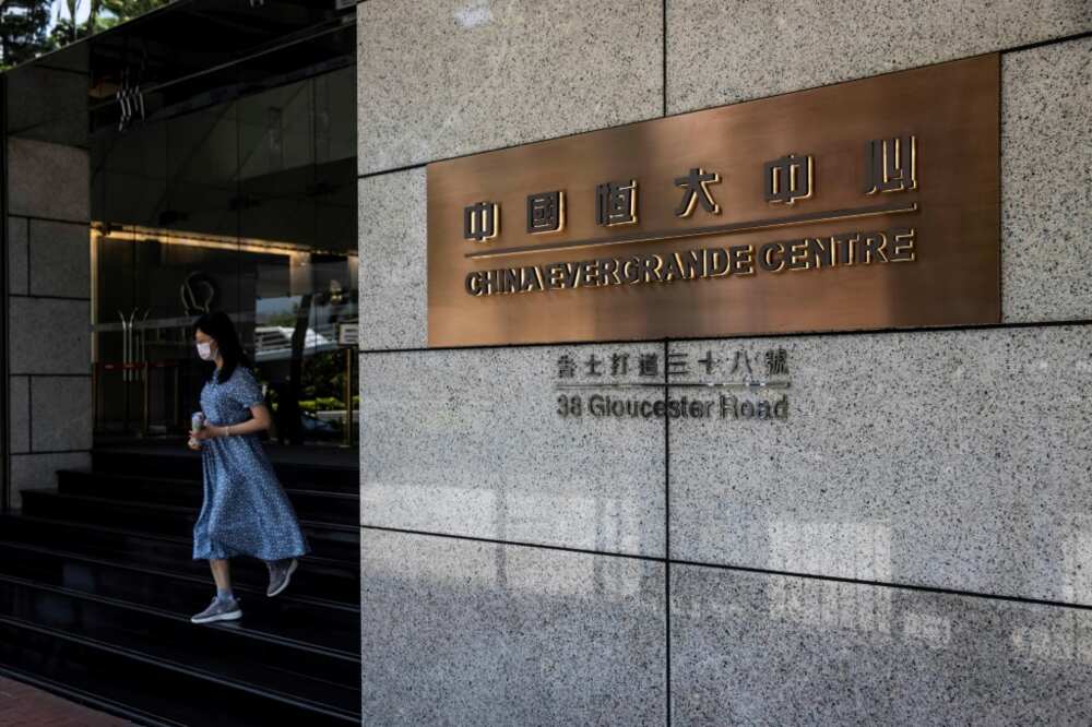 A woman leaves the China Evergrande Centre in Hong Kong on in July 2022