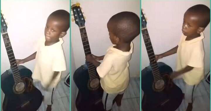 Little boy sings with melodious voice, plays guitar in video