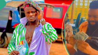 “You shall never lack”: Portable blesses man foreign currency, sprays money on fans in videos