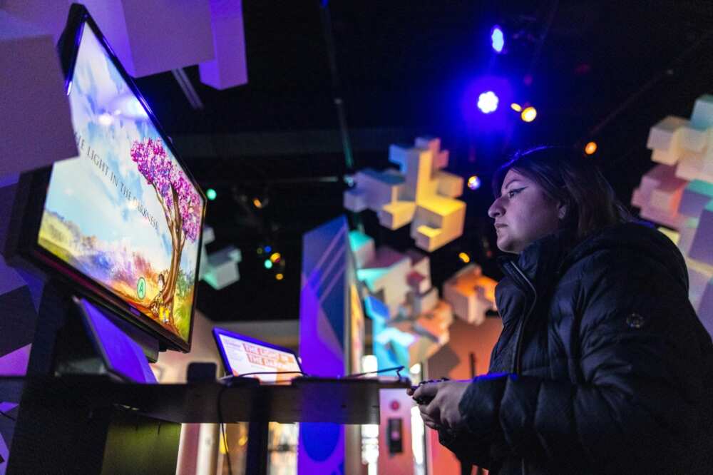 Jacquelyne Vargas, 17, plays 'The Light in the Darkness,' a video game about a family of Polish Jews in France during the Holocaust, at the Museum of Pop Culture in Seattle on February 23, 2023