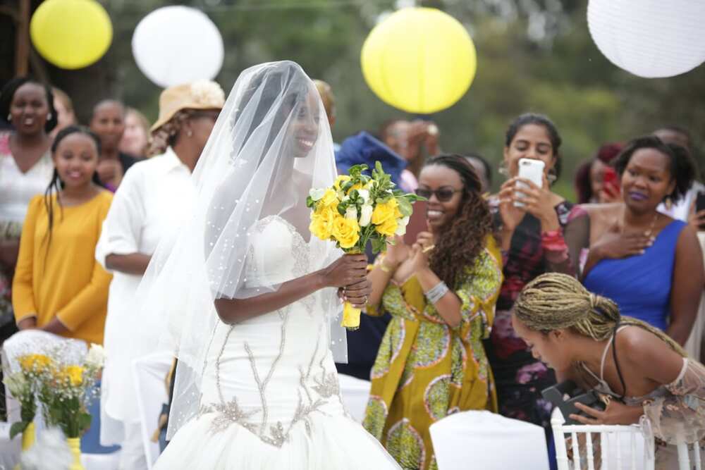 Nairobi couple dazzle in colourful wedding, bride wheeled to venue on handcart