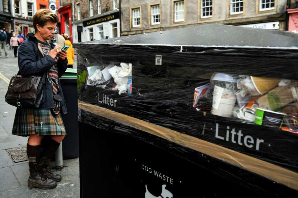 Bins have not been emptied, leaving rubbish overflowing and piled on the street