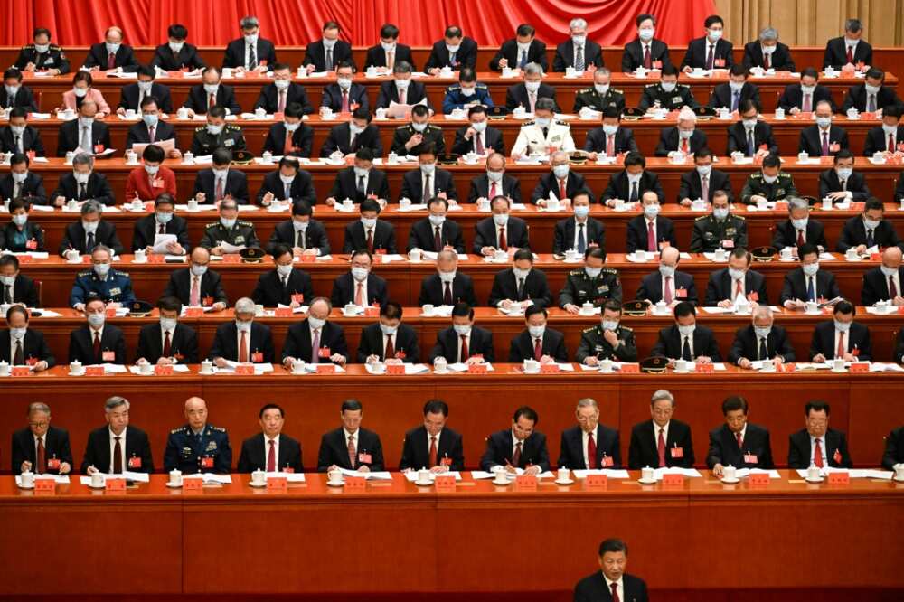 China's President Xi Jinping (front right) speaks during the opening session of the 20th Chinese Communist Party's Congress at the Great Hall of the People in Beijing