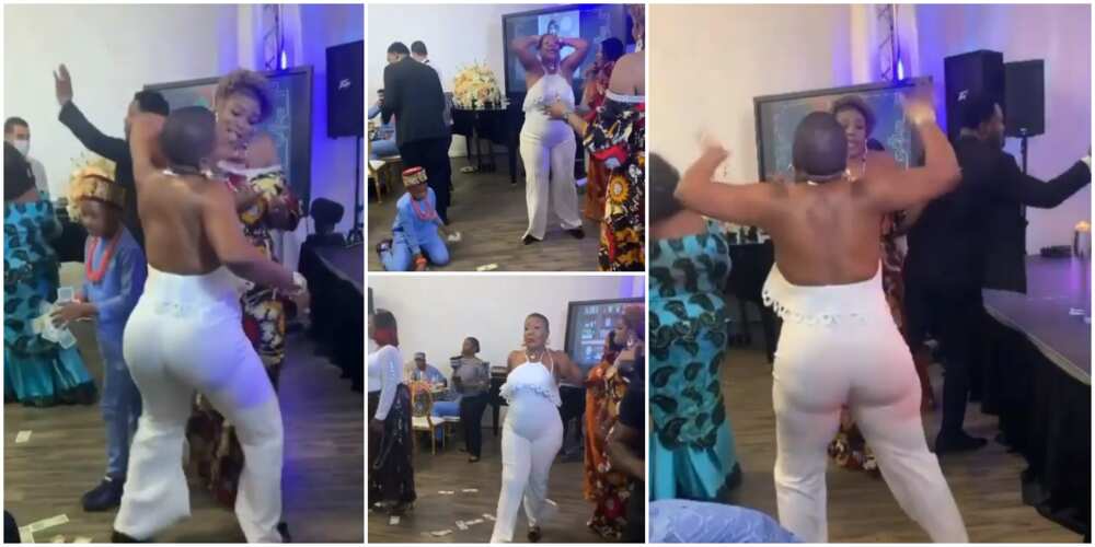 Lady on armless dress thrills guests at birthday party with weird marching dance moves in viral video