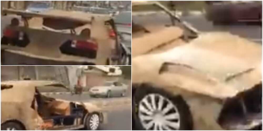 Nigerian man constructs sport car with condemned iron and carton, cruise around town with it