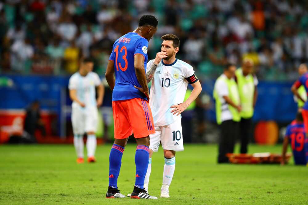 Yerry Mina and Messi.