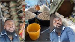"Na here I dey get my urgent N2k": Photos of man selling raw rice and beans in Port Harcourt go viral