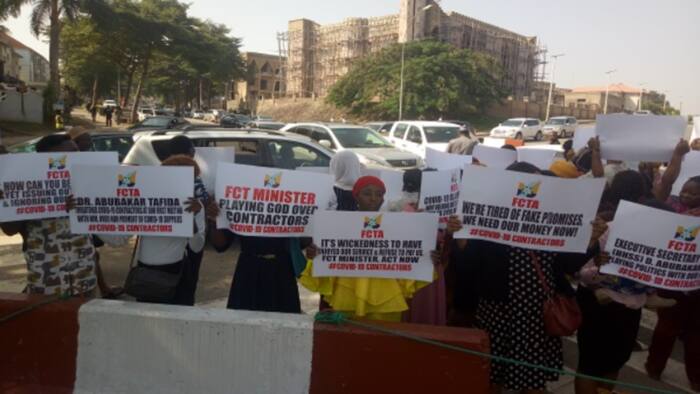 Mass protest hits Abuja as COVID-19 contractors block FCT minister’s office