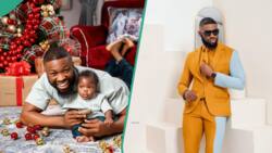 "Best transition ever": Stan Nze and son show off dress transition, netizens rate them
