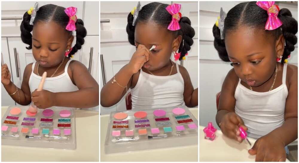 Photos of a baby girl applying her make-up.