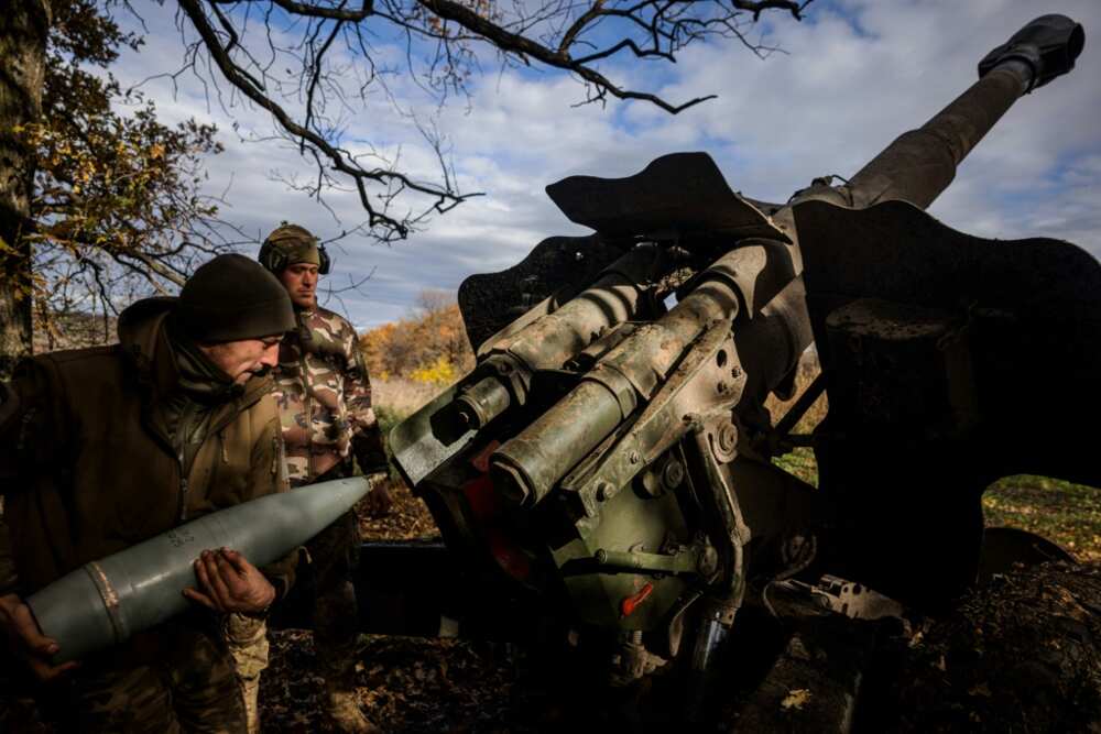 Ukrainians reload during the assault on Russians lines at Bakhmut in the Donbas