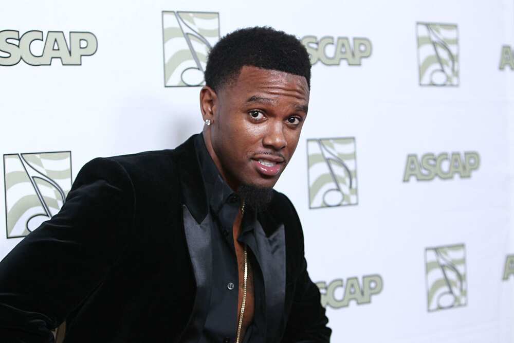 Daniel Gibson posing for a photo in a black outfit