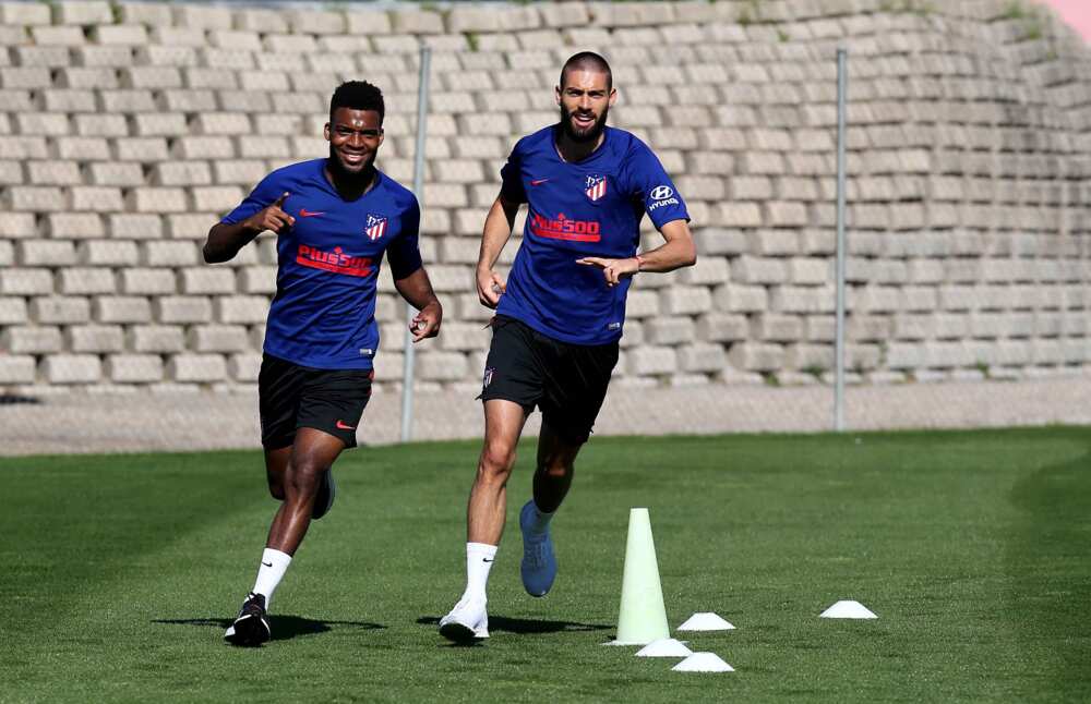 Thomas Lemar and Yannick Carrasco in action