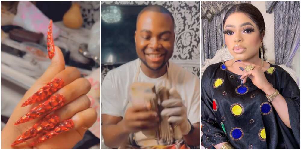 Bobrisky spoils his male nail technician silly, gives him thousands of naira for service rendered