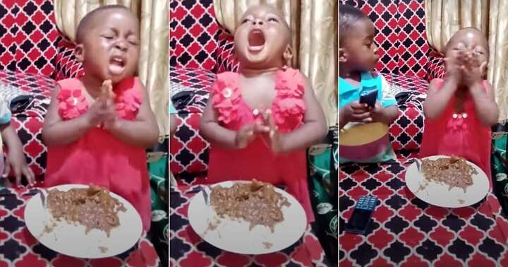 Little girl prays over food
