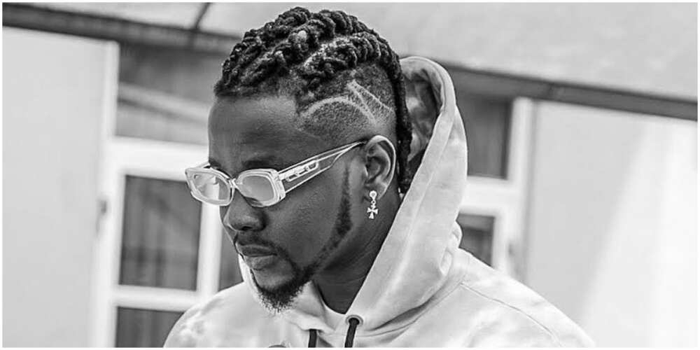 Kizz Daniel shows fans his expensive luxury rides and new mansion (photo)