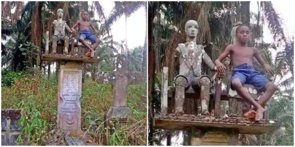Nigerians react to photo of a young boy sitting beside a deity in a shrine, many say he is a spirit
