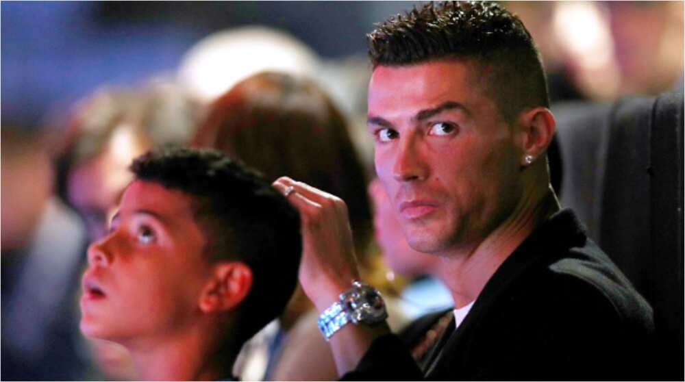 Cristiano Ronaldo and son Cristiano Jr. Photo Credit: Getty Images Cristiano Ronaldo and son Cristiano Jr. Photo Credit: Getty Images