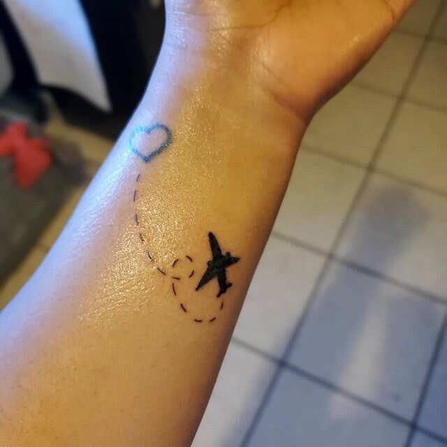 small star wrist tattoos