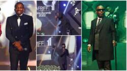 “Men supporting men”: Funny video as comedian Bovi reduces microphone to MI’s height as rapper comes on stage