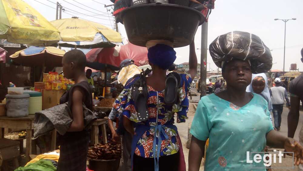 Traders and buyers at a popular market in Lagos state. Photo credit: Esther Odili