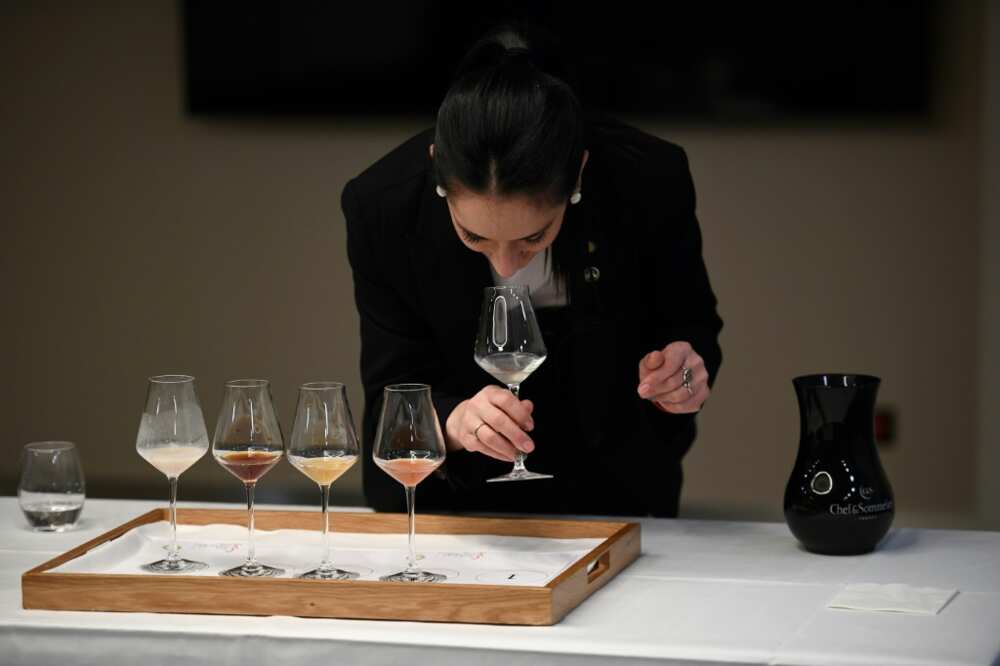 Candidate Valeria Gamper of Argentina takes part in a cocktail-tasting trial at the championships