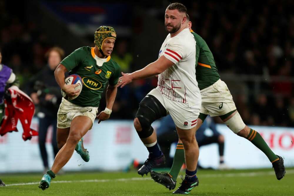 Try-scorer - South Africa wing Kurt-Lee Arendse (L) on the attack against England at Twickenham