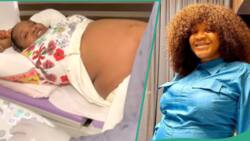 Actress Uche Ogbodo displays bare belly as she reveals she’s pregnant with twins: “God protect you”