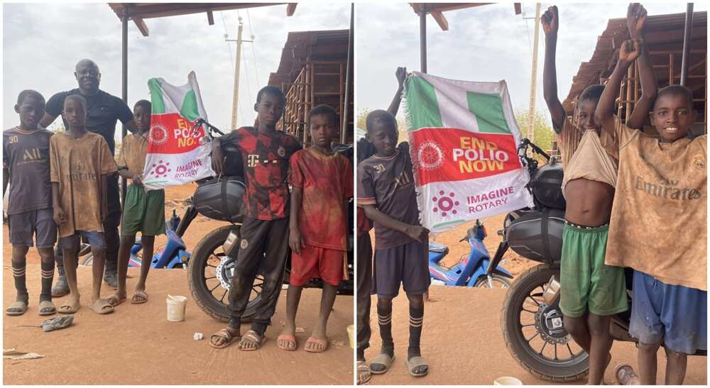 Kids welcome Nigerian biker Kunle Adeyanju to Mali.