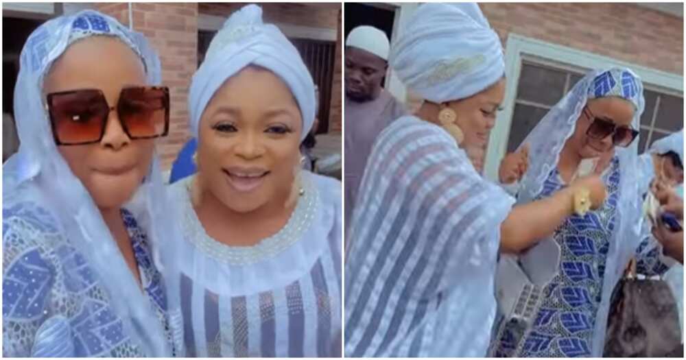 Kemi Afolabi sprays friend with money